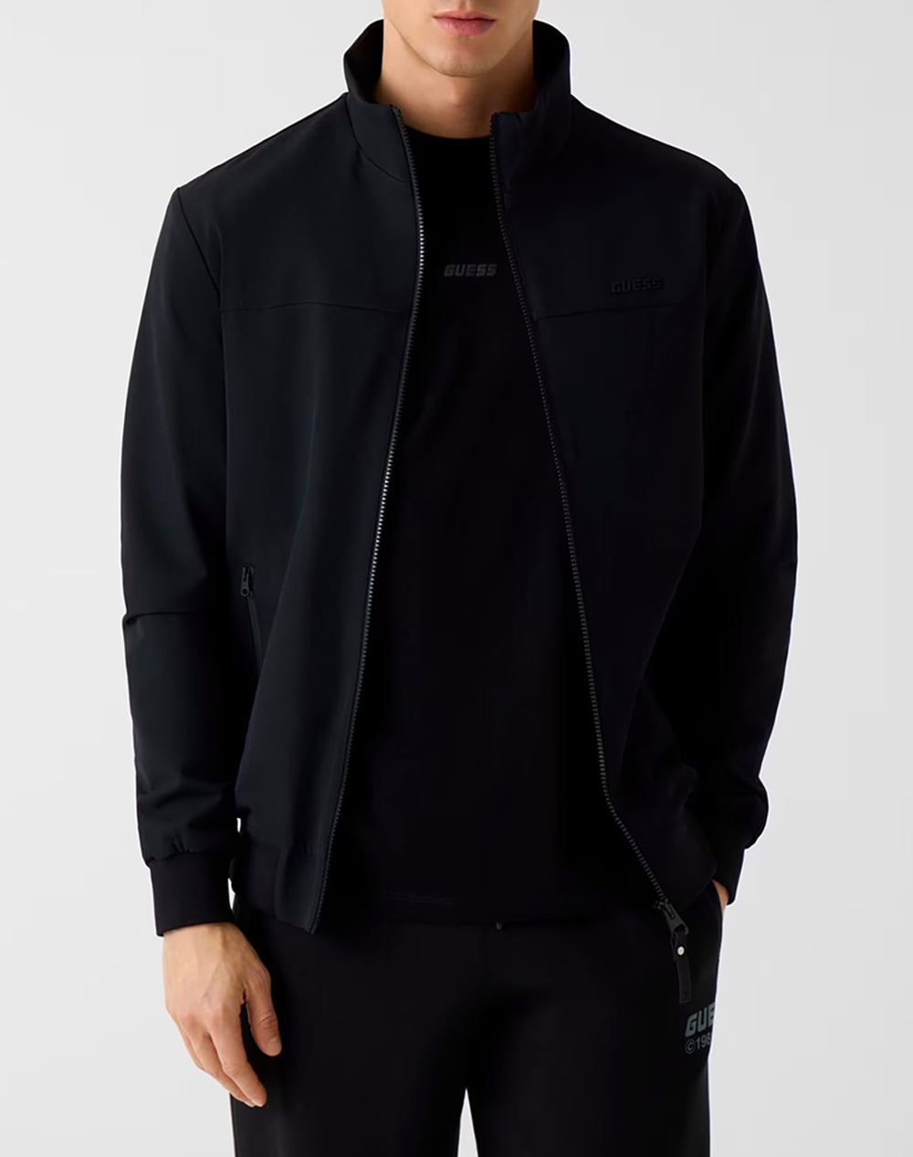 Guess Ανδρικό Μπουφάν Μαύρο Πολυαμίδιο Ελαστάνη