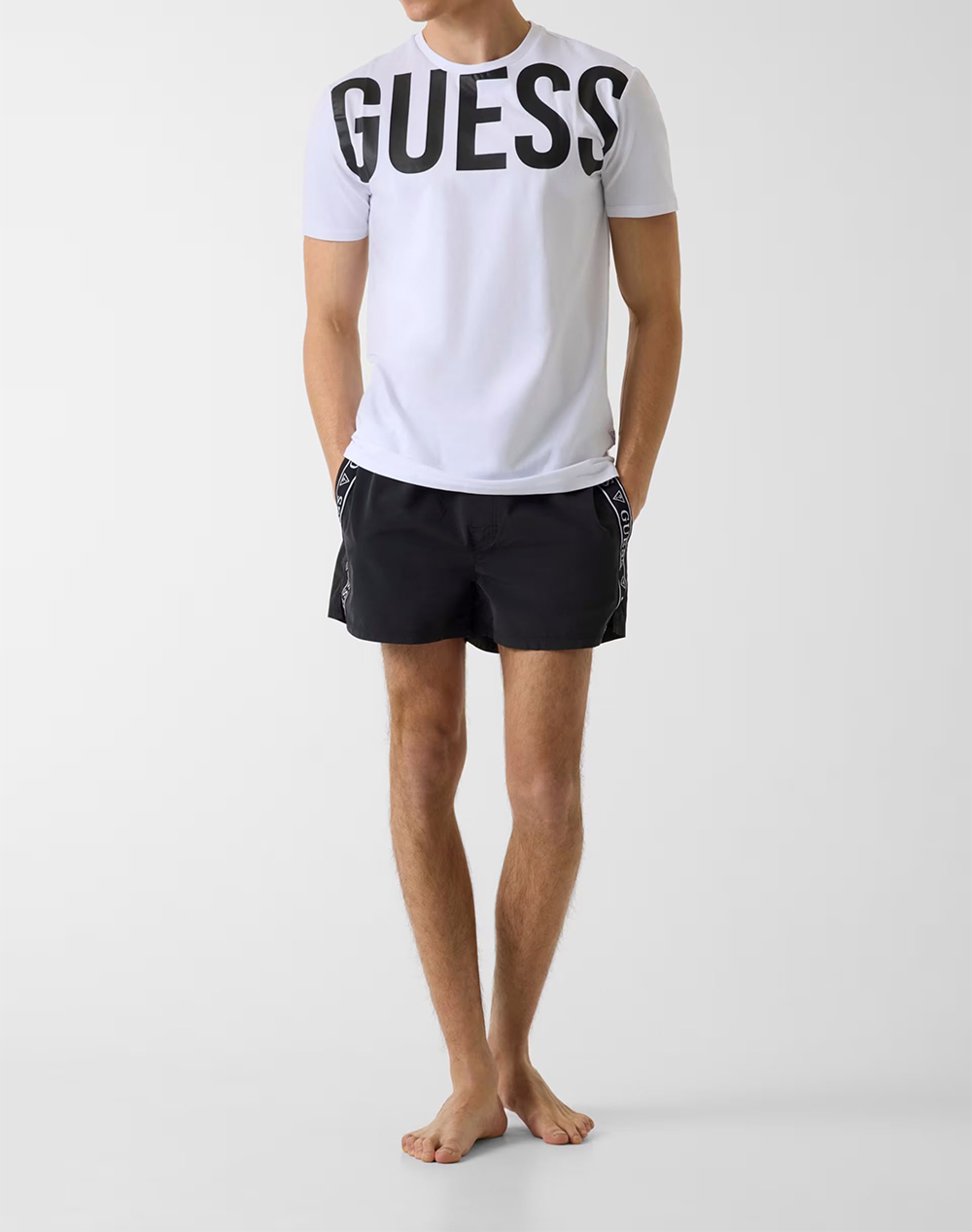 Guess Swimtrunk Logo Tape Medium Μαγιό Ανδρικό F6Gt00Wn162-Jblk Black ανδρικά ρούχα μαγιό Σορτς Politikos Shop Πολιτικός